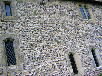 Flint walls of the rectory at All Saints, Westdean