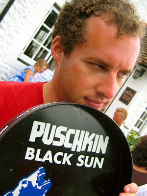 Adam with Puschkin drinks tray at the Tiger Inn, East Dean village, East Sussex