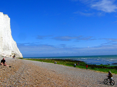 White chalk cliffs and shingle beach at Cuckmere Haven, East Sussex