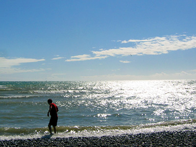Wading in the sea at Cuckmere Haven, East Sussex