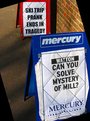 Headlines on local newspaper sandwich boards, Watton-at-Stone