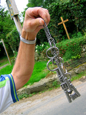 Derek the verger holding the keys to the church of St Margarets Broomfield