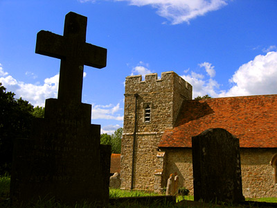 Graveyard and church tower at St Margarets, Broomfield
