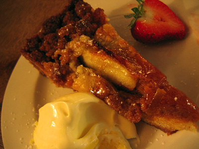 Treacle tart with clotted cream and strawberry at the Farmers Arms pub, Combe Florey, Somerset