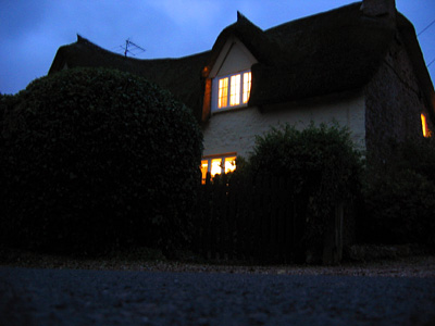 A thatched cottage at night, Somerset