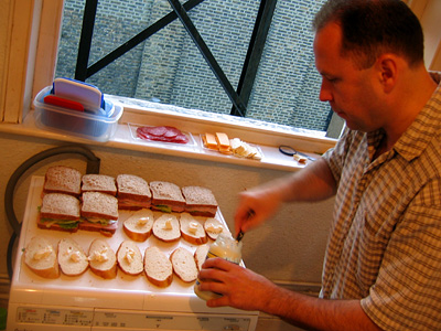 Aleks preparing sandwiches for a picnic lunch