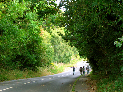 English Country Walks group on road near Stonehenge
